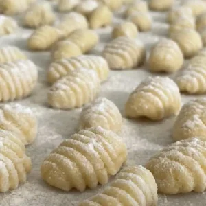 Freshly rolled ridged potato gnocchi dusted with flour