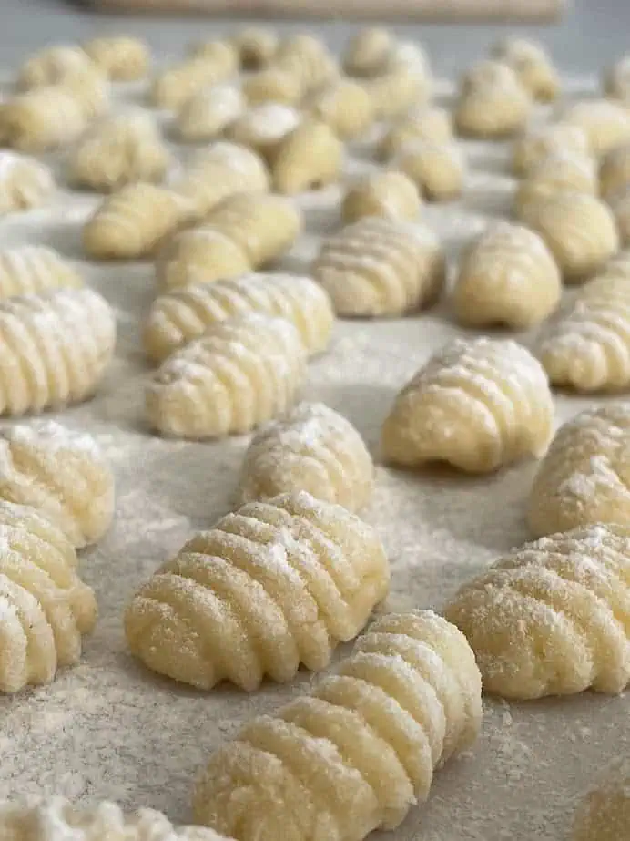 Freshly rolled ridged potato gnocchi dusted with flour