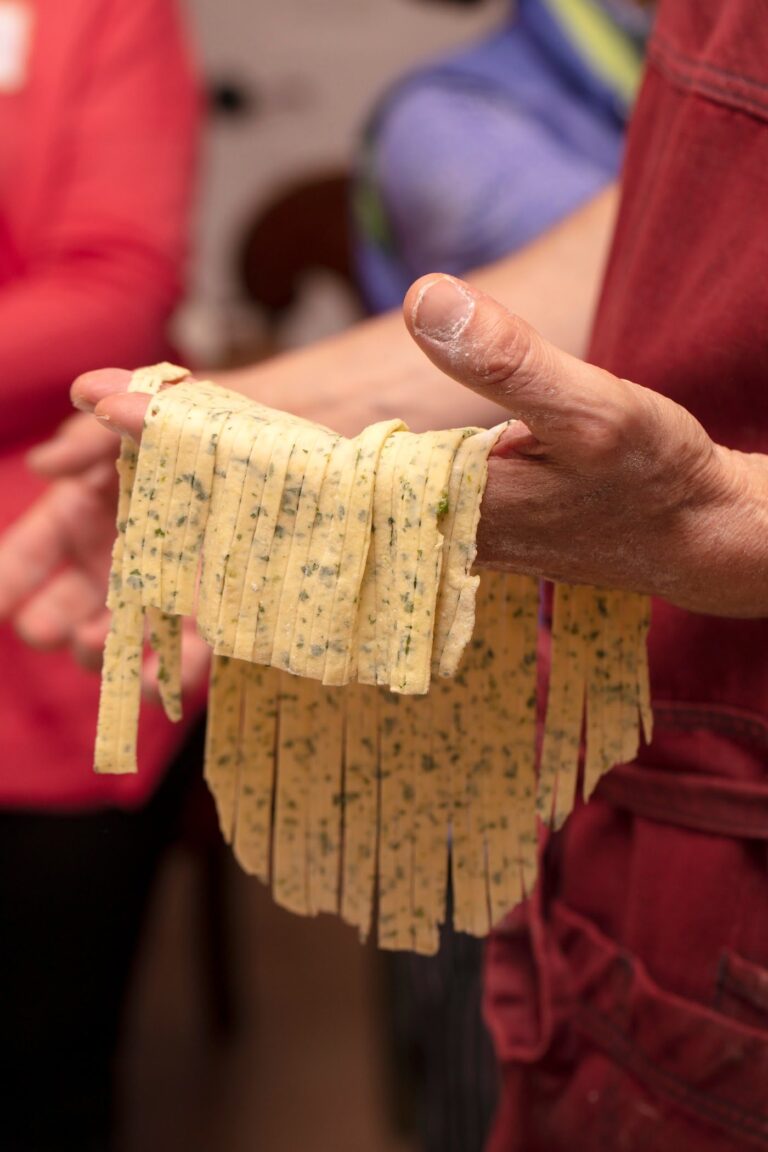 Fresh haloumi cheese being pulled by hand at a Fleurieu class